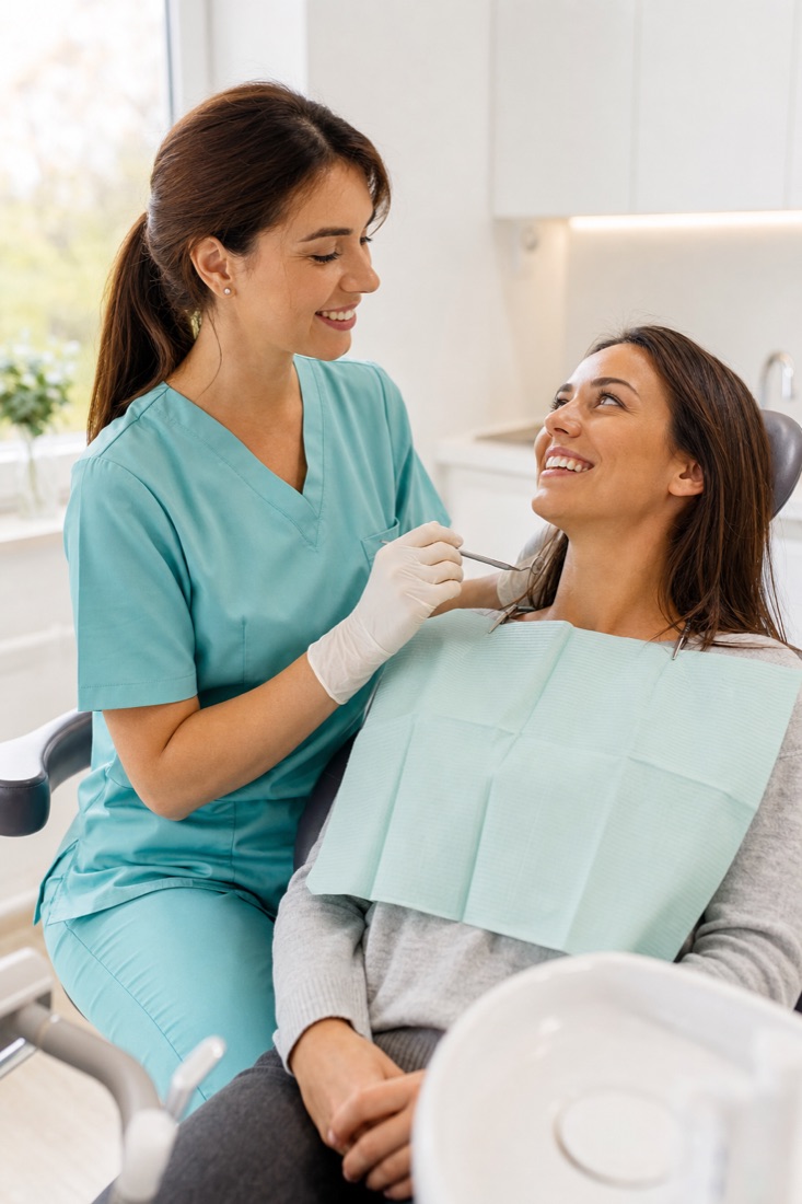 A gentle hygienist caring for a patient